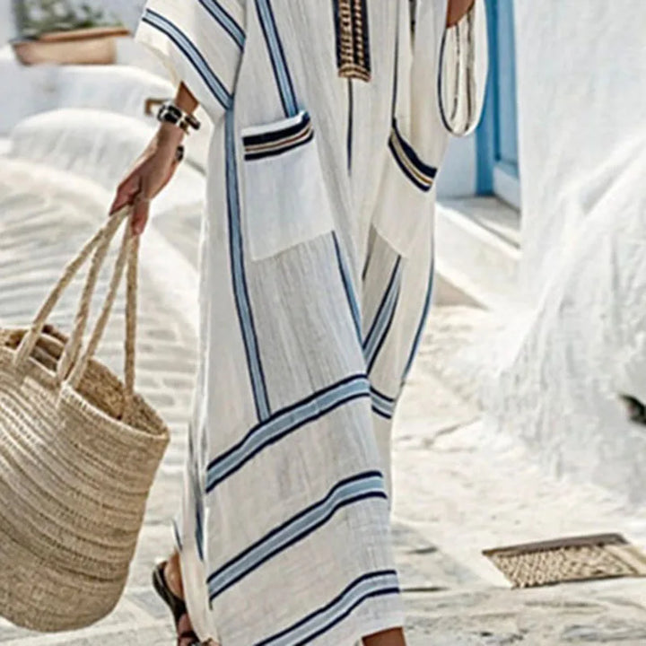 Flowing women's boho maxi dress with V-neck & striped detail. Versatile long summer dress, resort & vacation.