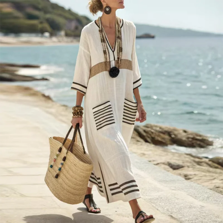 Comfortable V-neck striped boho maxi dress for women. Elegant flowing long dress for summer, beach, or casual.