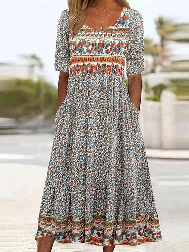 Women's boho midi dress with pockets, gathered waist, short sleeves, perfect for summer casual wear.