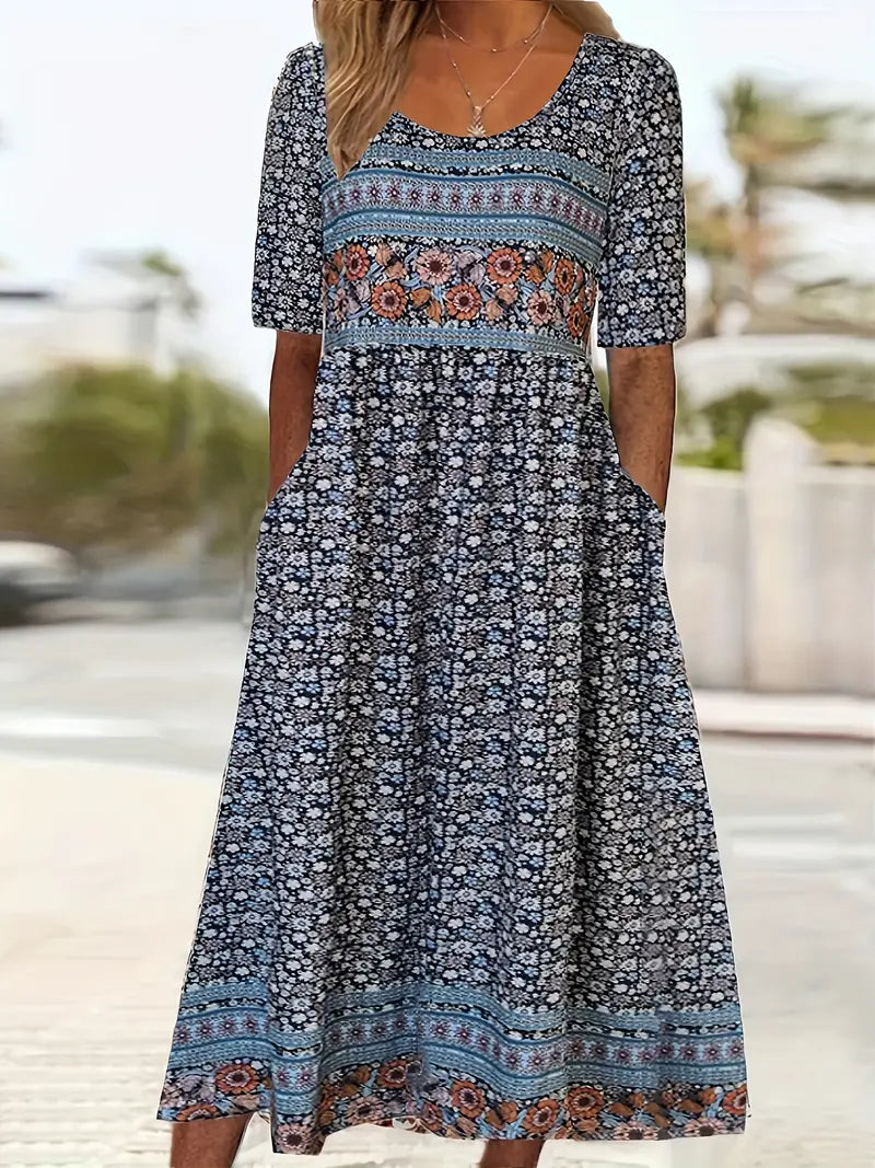 Flowy bohemian midi dress for women, featuring a round neck, short sleeves, and convenient pockets. Ideal for summer.