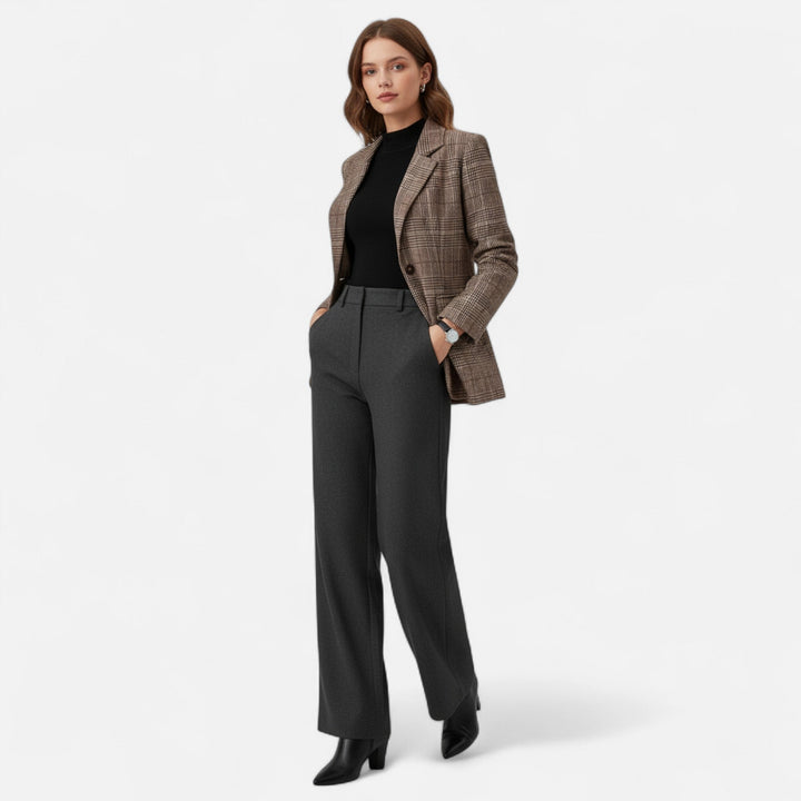 Elegant women's plaid jacket featuring a single-breasted design and tailored fit, ideal for sophisticated office outfits.