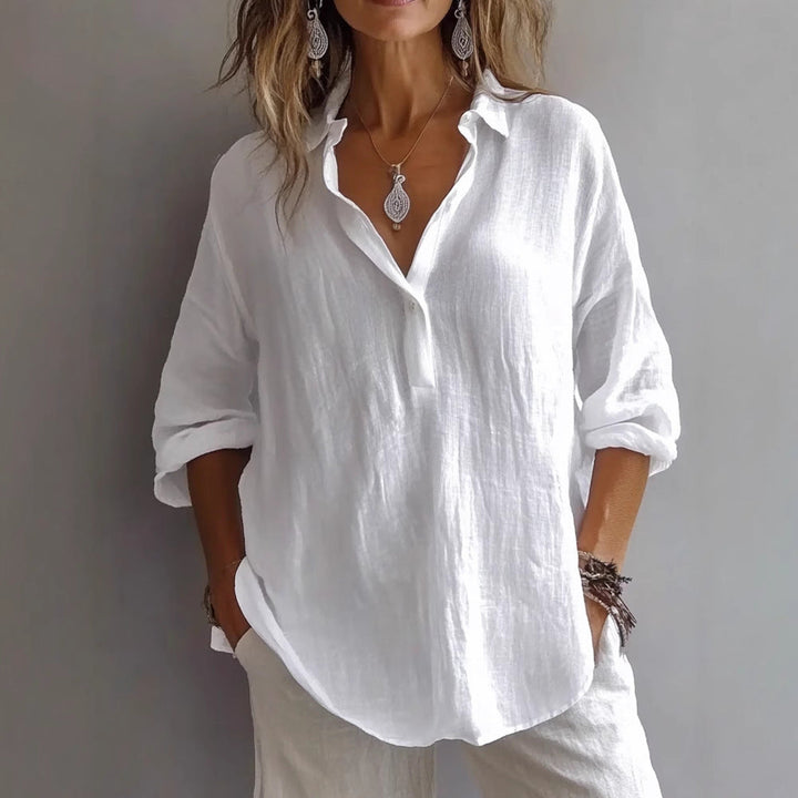 Women's button-down shirt with wide sleeves in a relaxed fit for effortless style.