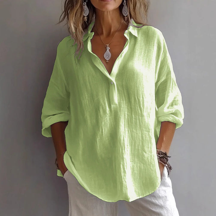 Everyday wear women's button-down shirt, designed with a relaxed fit and stylish wide sleeves.
