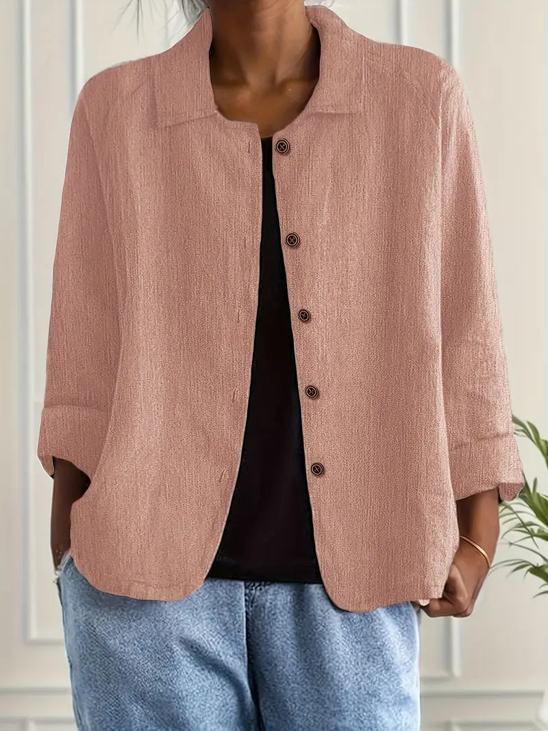 Women's collared button-front top with three-quarter sleeves, relaxed fit for versatile everyday wear.