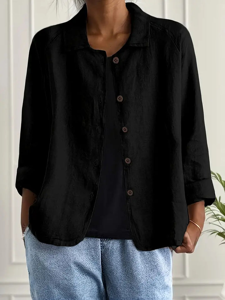 Full view of a relaxed fit women's button-front collared top, perfect for spring/summer comfort.