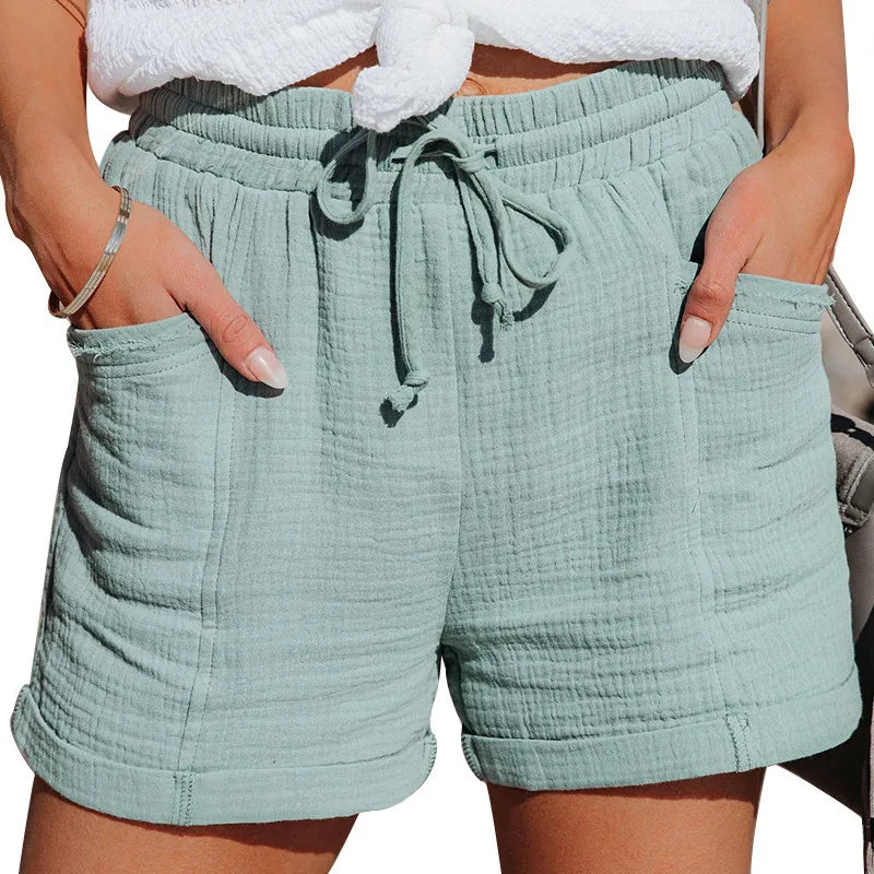 Comfortable relaxed fit women's shorts with elastic drawstring waist and deep pockets for everyday convenience.