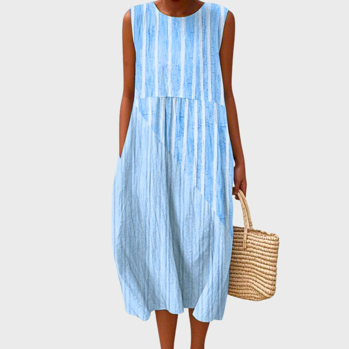 Versatile women's knee-length A-line dress; sleeveless, relaxed fit for ultimate summer comfort & daily style.
