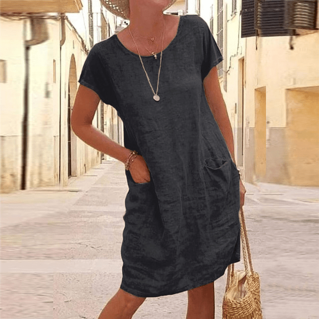 Women's casual mini dress with pockets, relaxed fit, short sleeve, round neck. Perfect for everyday summer style.