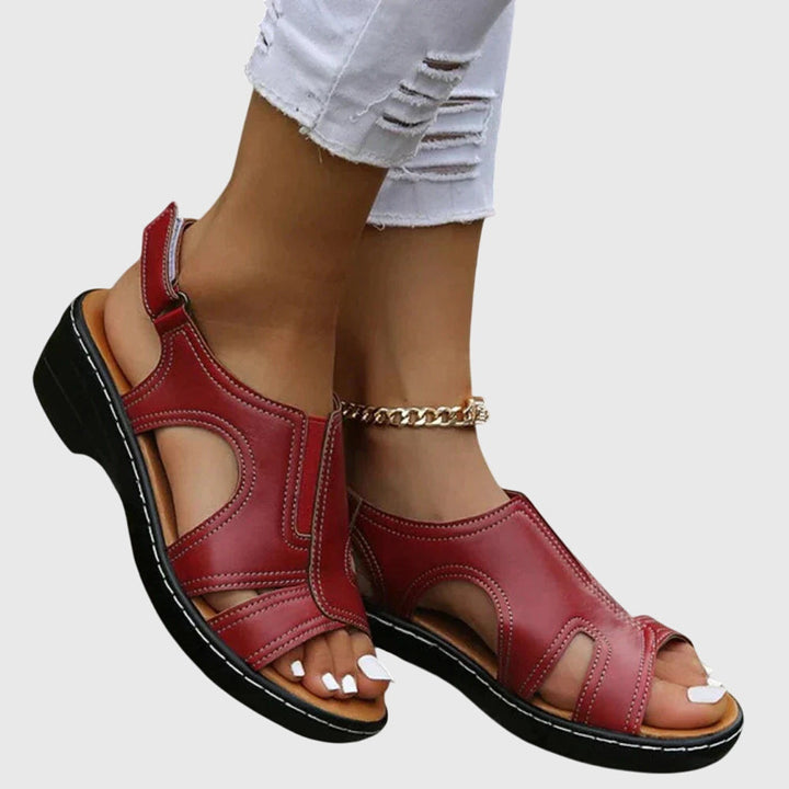 Black peep toe wedge sandals for women, casual slingback design for comfortable & stylish summer wear.