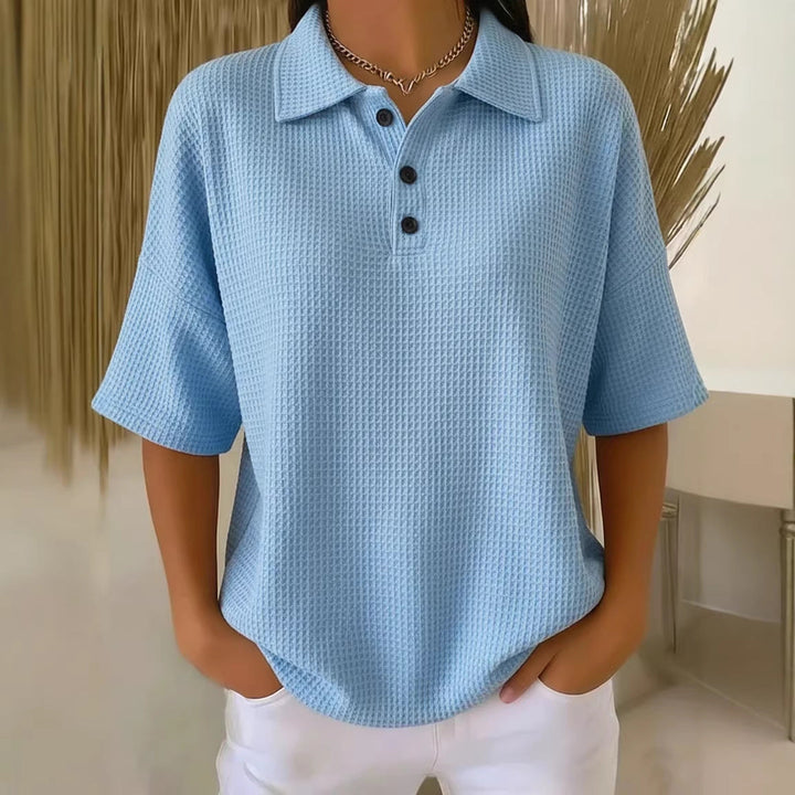 Comfy women's loose fit polo neck top. Short sleeve design, great for everyday spring fashion.