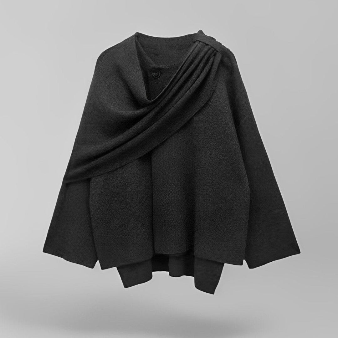 Women's drape cape coat paired with boots, showcasing chic, effortless style. Elegant outerwear for fall fashion.