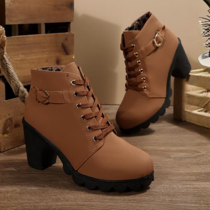 Stylish women's chunky lace-up ankle boots with a comfortable heel. Perfect for casual wear, autumn & winter fashion.