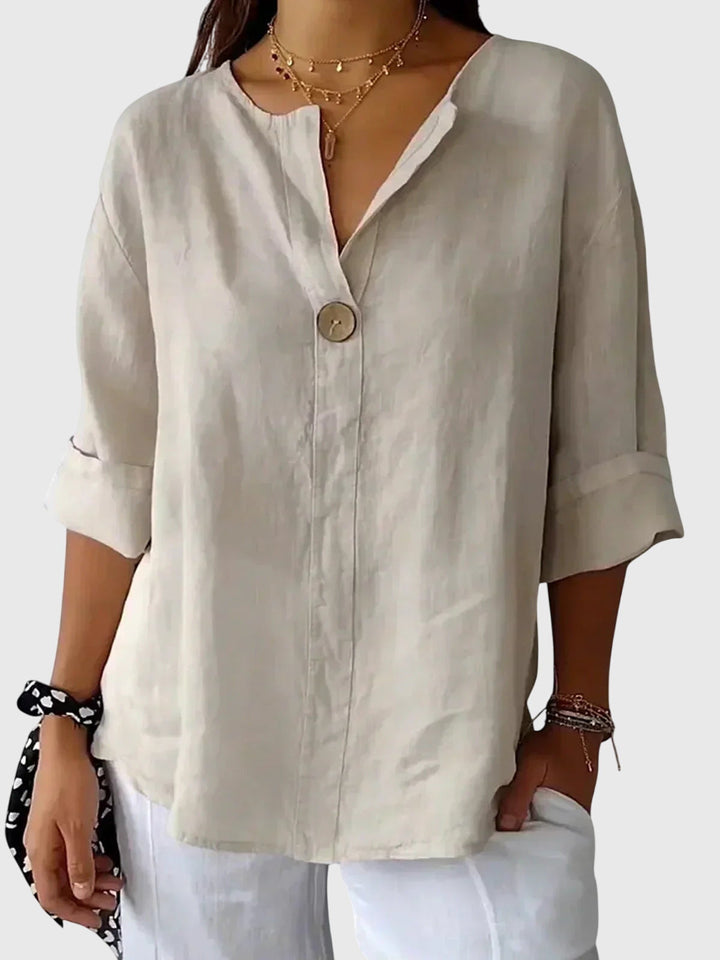 Women's chic blouse, elegant long sleeve top for everyday style & comfort. Flattering fit, versatile fashion.