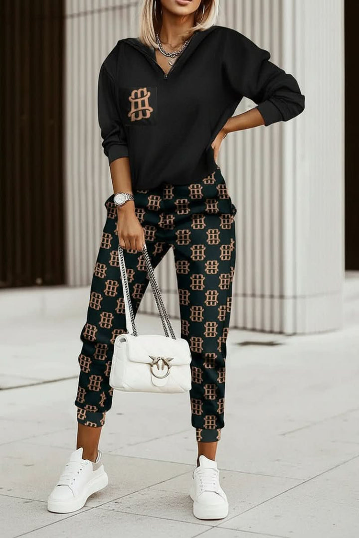 Women's two-piece tracksuit, a comfortable and stylish matching set for various activities.