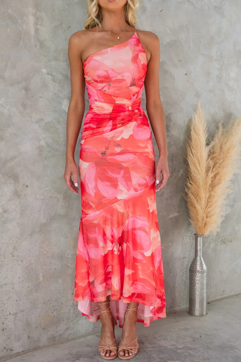 Asymmetric one-shoulder ruched floral maxi dress. Chic long dress for women attending summer weddings & parties.