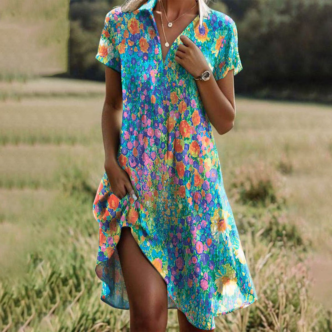 Flowy women's floral summer midi dress with comfortable style, ideal for daytime chic and feminine apparel.
