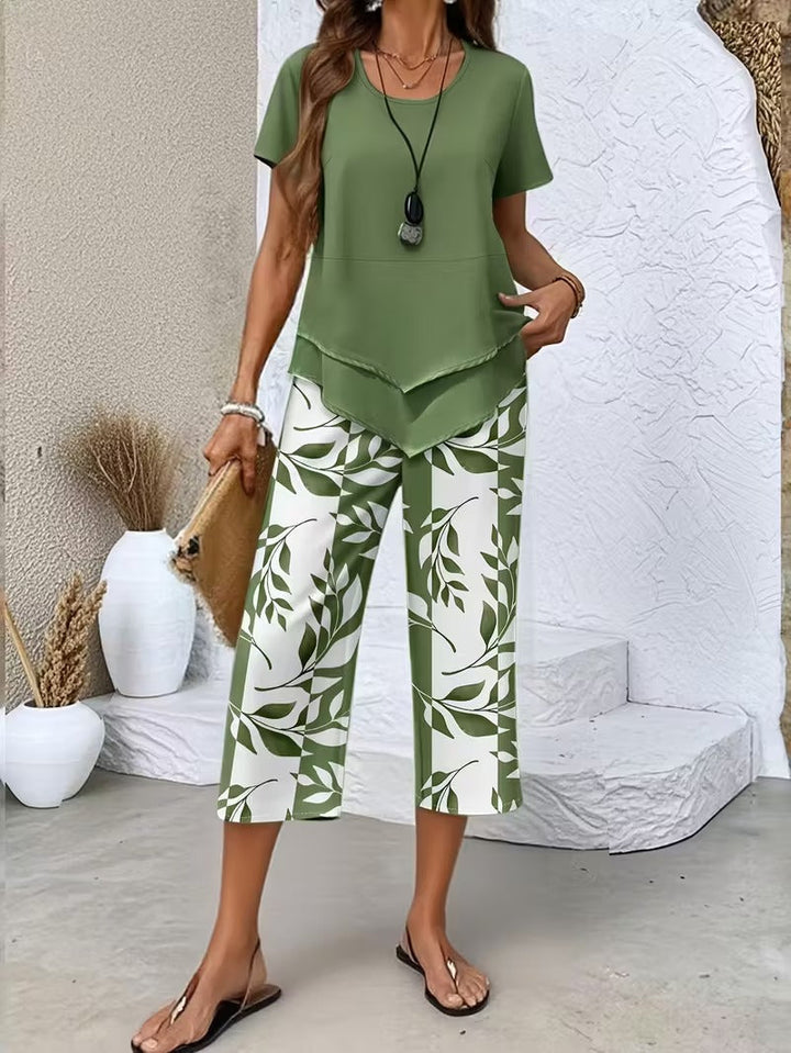Women's chic leaf print two-piece set, perfect for stylish summer or spring casual wear.