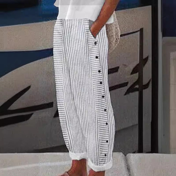 Women's chic striped relaxed fit pants with button accents, perfect for casual spring fashion & everyday wear.