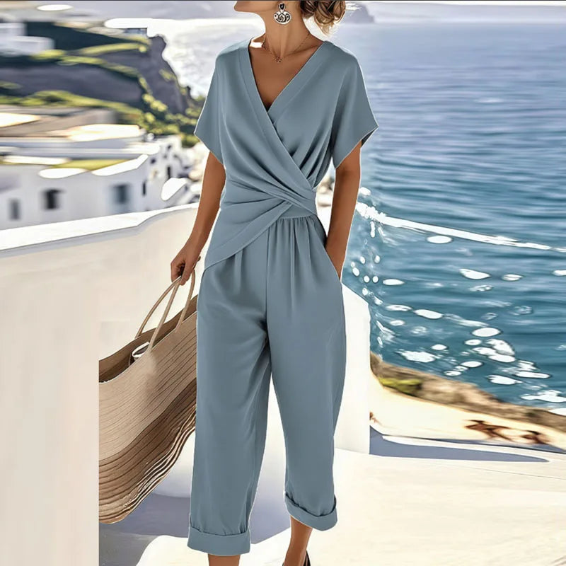 Stylish women's matching two-piece set with a trendy wrap top and relaxed pants, ideal for resort wear or summer outfits.