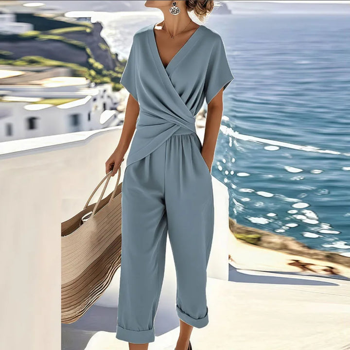 Stylish women's matching two-piece set with a trendy wrap top and relaxed pants, ideal for resort wear or summer outfits.