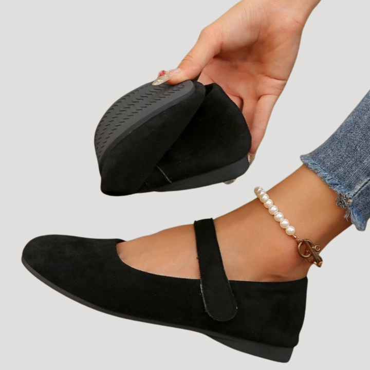 Women's classic Mary Jane buckle flats. Stylish, comfortable, and versatile footwear for everyday fashion.