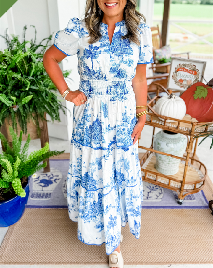 Flowy long Toile dress, perfect for spring/summer, with a stylish V-neck and tiered design.