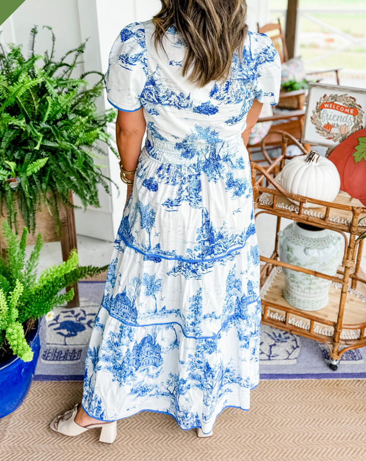 Beautiful Women's Classic Toile Maxi Dress with a smocked waist, V-neck, and tiered long skirt.