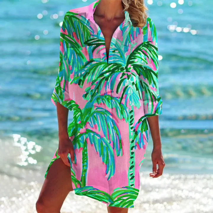 Women's collared button-up mini dress in a lightweight fabric, ideal for summer and resort fashion.