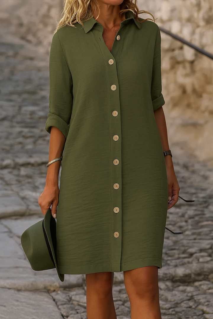 Stylish women's knee-length dress: collared, button front, roll-tab sleeves, relaxed fit for summer.