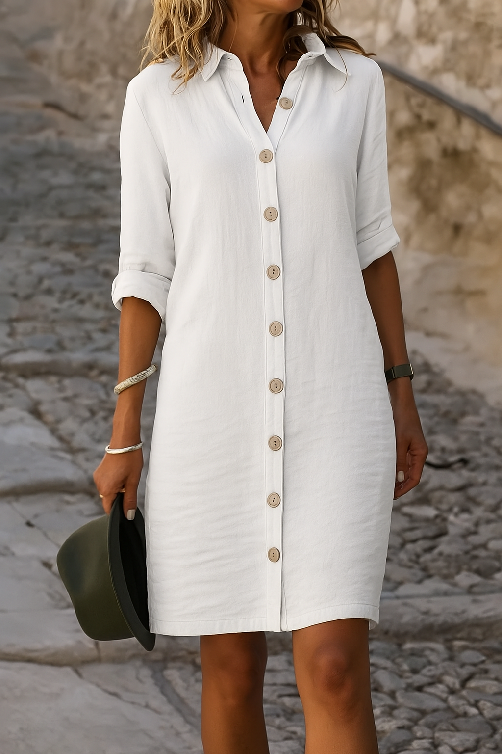 Versatile women's knee-length shirt dress; button front, collared, roll-tab sleeves for everyday style.