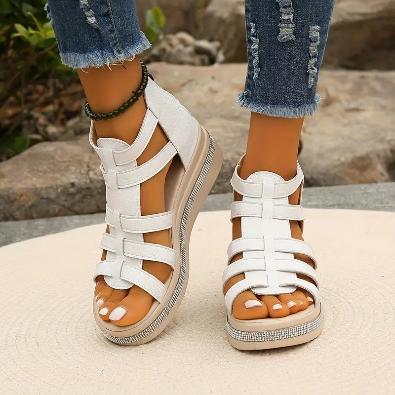 Summer-ready women's sandals, combining comfort features with sparkling rhinestones.
