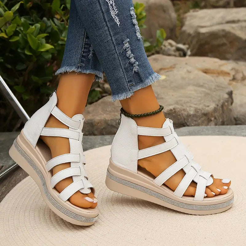Women's fashion sandals, designed for comfort with striking rhinestone embellishments.