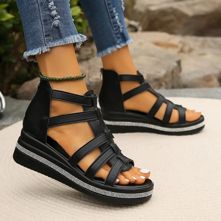 Fashionable women's comfort sandals with decorative rhinestones & orthopedic support.