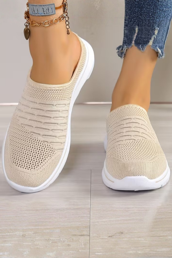 Lightweight black women's slip-on platform mules for comfortable daily wear. Breathable casual summer footwear.