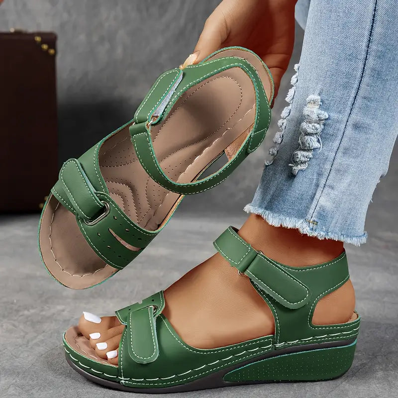 Stylish women's wedge sandals with adjustable hook-loop straps for casual, comfortable everyday wear.