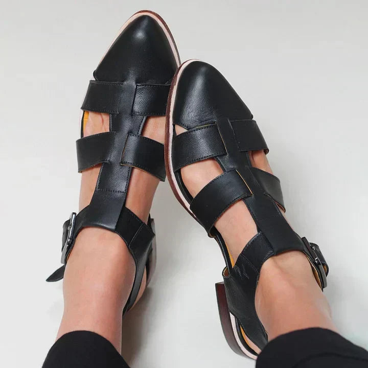 Strappy women's flat sandals with adjustable strap, open toe design for comfortable everyday summer wear.