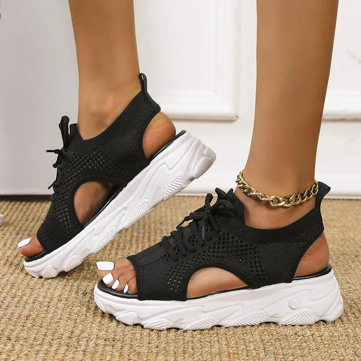 Orthopedic women's sandals with a comfortable platform sole, lace-up style, and great for walking.