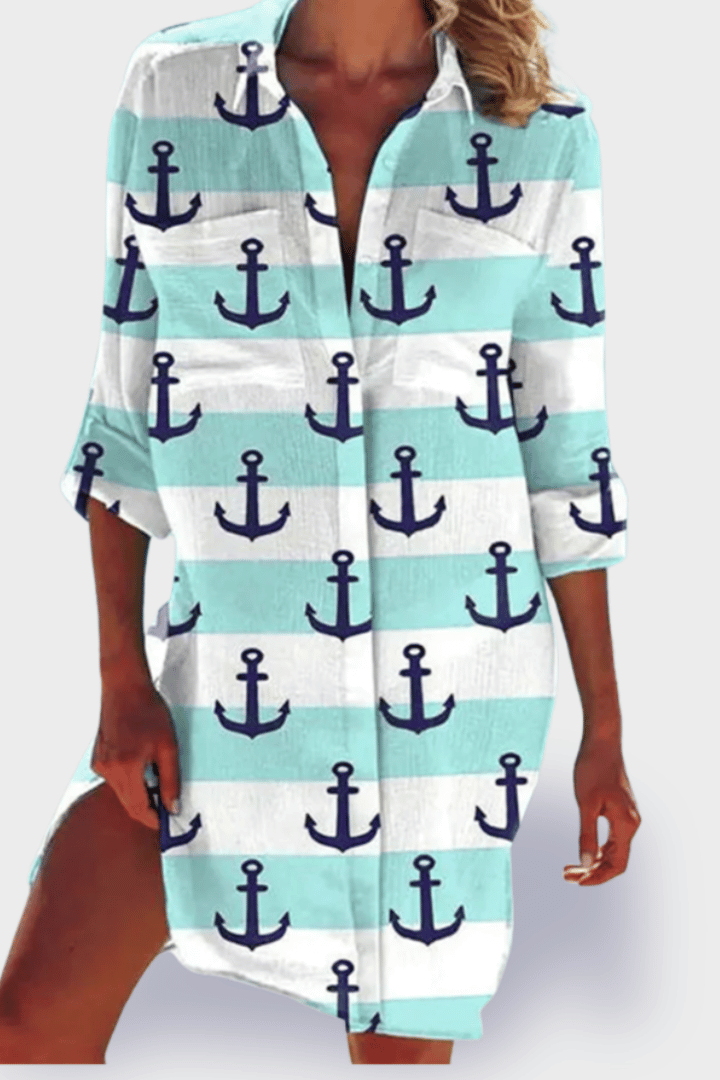 Patterned women's midi dress with a comfortable relaxed fit. Versatile fashion for casual summer and beachwear.