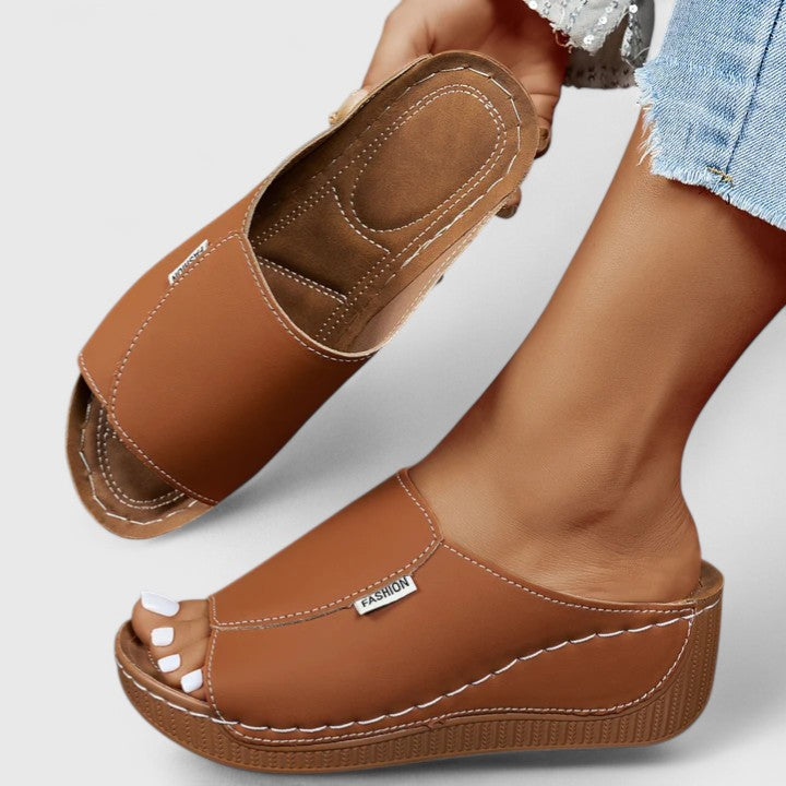 Chic open-toe women's flats, perfect for comfortable summer walking and casual wear.