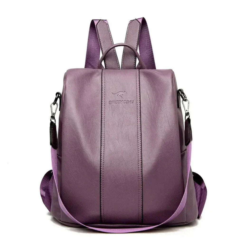 Chic women's anti-theft fashion accessory, a convertible backpack & shoulder bag with discreet secure pockets.