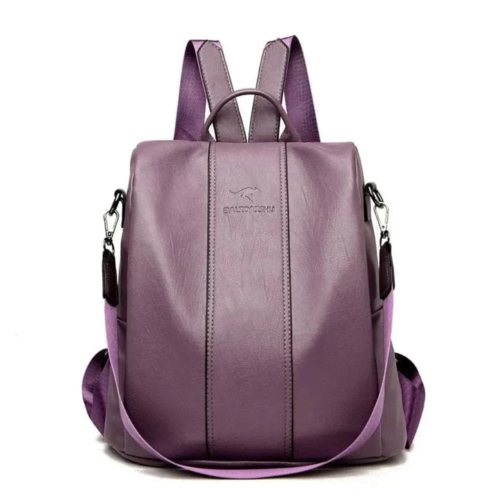 Chic women's anti-theft fashion accessory, a convertible backpack & shoulder bag with discreet secure pockets.