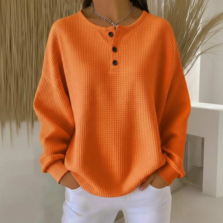 Red women's cozy waffle knit sweater, a warm pullover top with a textured knit for winter wear and casual style.