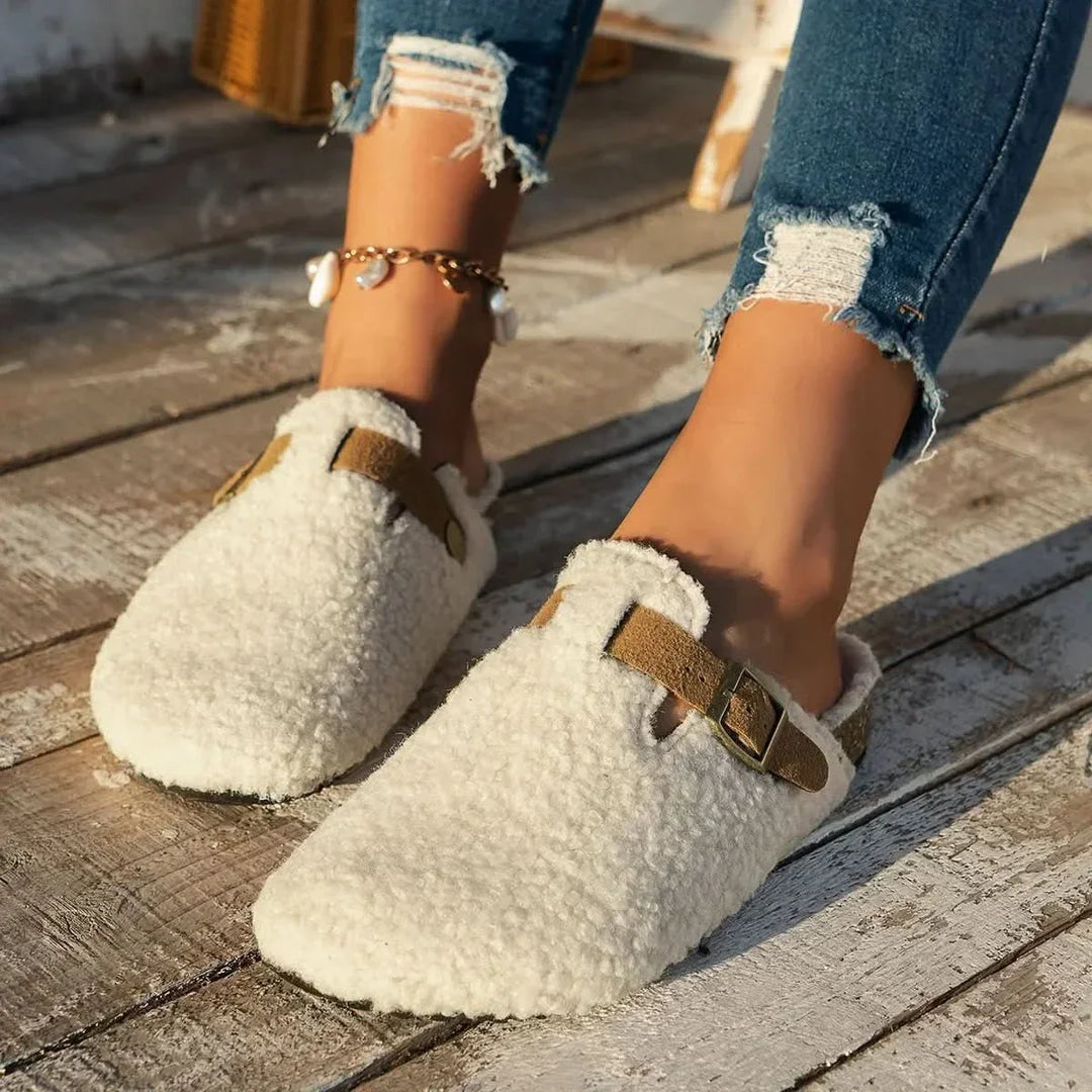 Plush women's winter slip-on mules, ideal cozy slippers for indoor lounge wear or quick outdoor trips.