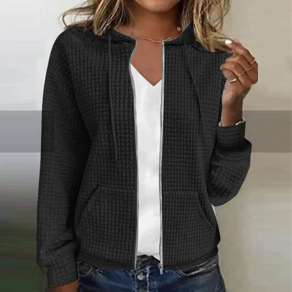 Women's fashionable zip-front comfort jacket. Cozy layering piece, perfect for casual outings and everyday wear.