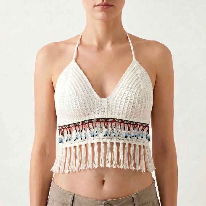 Stylish women's crochet halter crop top with fringe for summer beachwear and bohemian casual outfits.