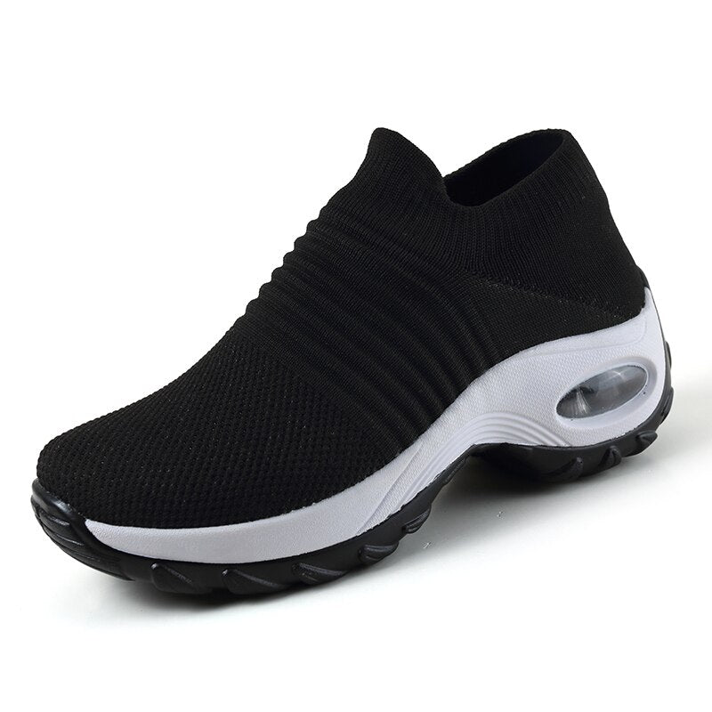 Side view of women's ergonomic orthopedic comfort shoes with cushioned arch support for daily wear.