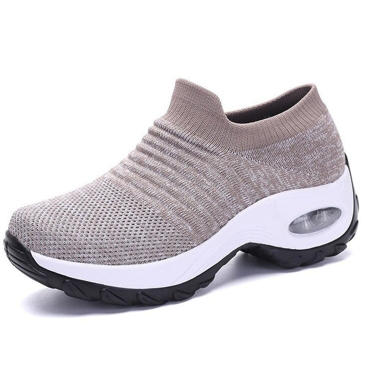 Close-up of cushioned sole on women's orthopedic comfort shoes, providing superior arch support.
