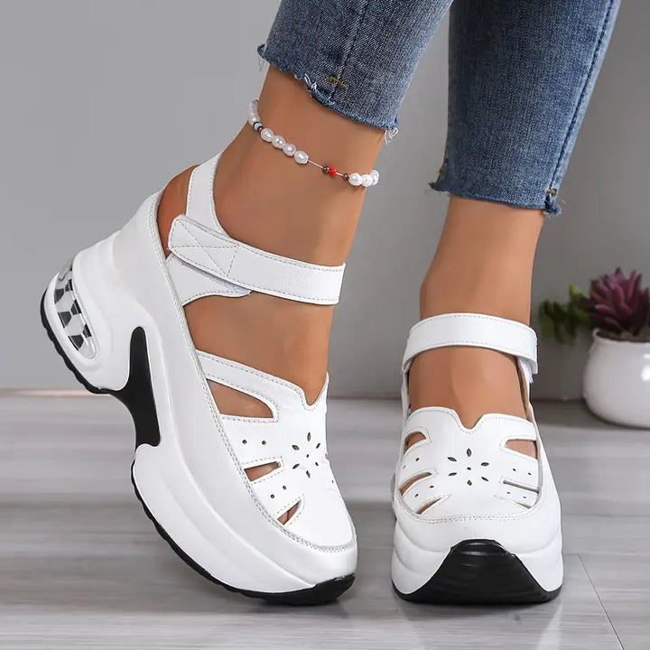 Orthopedic women's wedge sandals with arch support & cushioned platform, ideal for comfortable all-day wear.