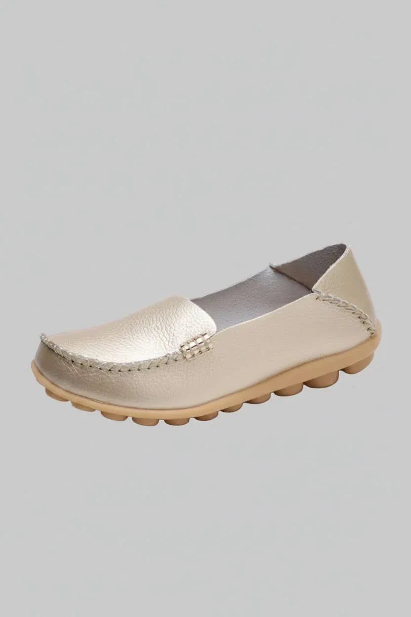 Travel-friendly women's round toe flats, slip-on design, ultimate comfort.