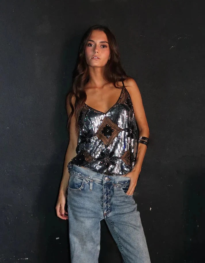 Chic women's dazzling sequin party top, sleeveless and glittery. Perfect evening wear for special occasions.